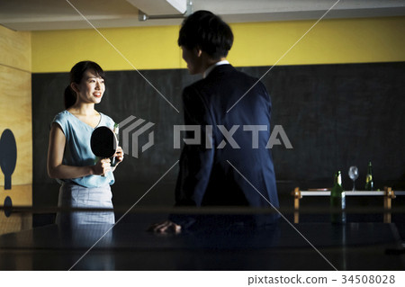 Couple playing table tennis Couple playing table tennis 34508028