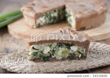 Pie with green onions and egg Pie with green onions and egg 34510600