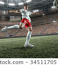 Soccer player performs an action play  34511705