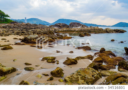 Rocky beach at sunset. Beautiful gold sundown Rocky beach at sunset. Beautiful gold sundown 34516801