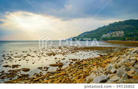 Rocky beach at sunset. Beautiful gold sundown Rocky beach at sunset. Beautiful gold sundown 34516802