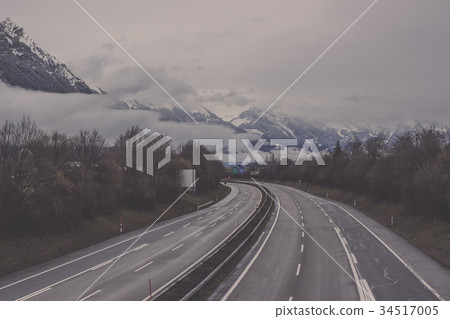Fog and roadside trees on the way to Interlaken 34517005
