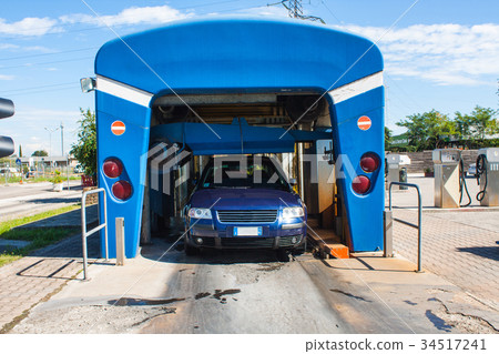 Automated portal carwash, a car running through. 34517241