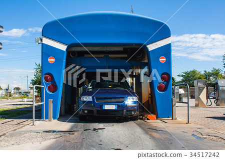 Automated portal carwash, a car running through. 34517242