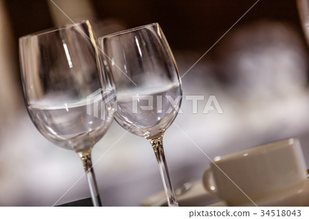 Wine glasses on a table Wine glasses on a table 34518043