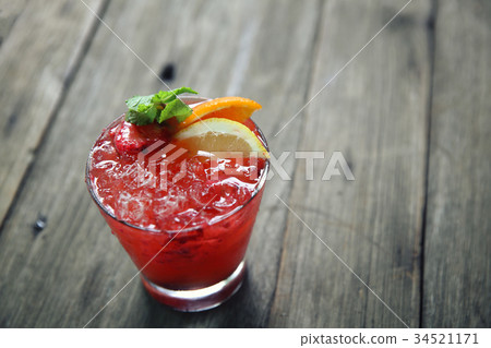 mai tai cocktail with orange cherry fruits on wood background mai tai cocktail with orange cherry fruits on wood background 34521171