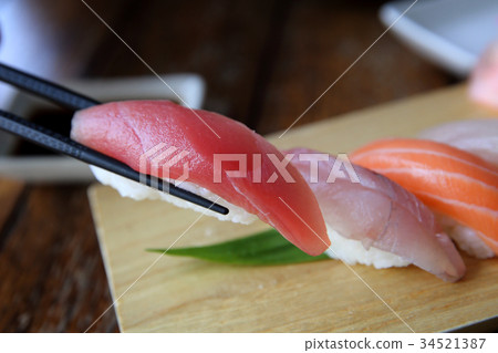Mix sushi tuna salmon sea bass sushi on wood background japanese food 34521387