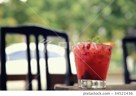 mai tai cocktail with orange cherry fruits on wood background mai tai cocktail with orange cherry fruits on wood background 34521436