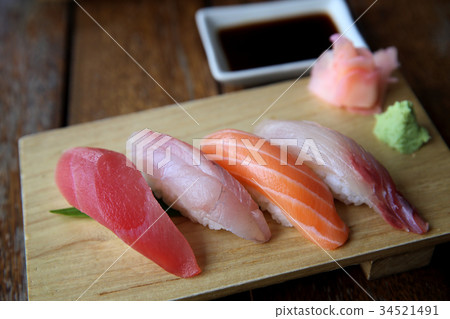 Mix sushi tuna salmon sea bass sushi on wood background japanese food 34521491