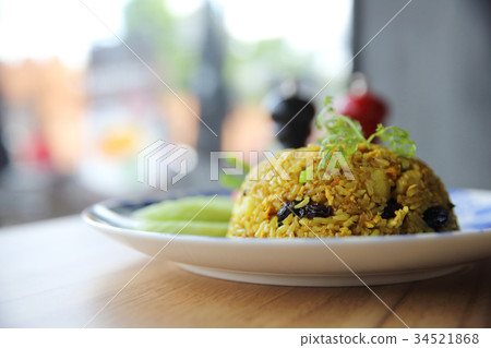 Pineapple fried rice , Fried rice with pineapple raisin chicken , Thai food Pineapple fried rice , Fried rice with pineapple raisin chicken , Thai food 34521868