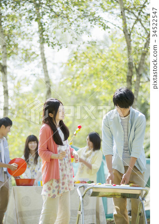 College students preparing for BBQ College students preparing for BBQ 34522547