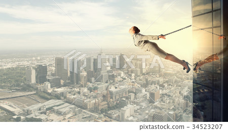 Roped businesswoman Roped businesswoman 34523207