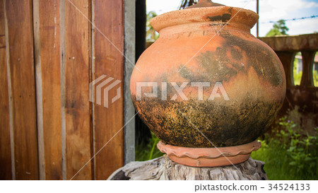 Jar made of clay on seletive focus 34524133