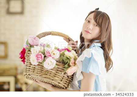 Woman with flower basket 34524333