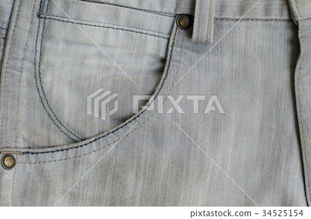 Texture of Gray Denim Jeans (Part of Trousers). 34525154
