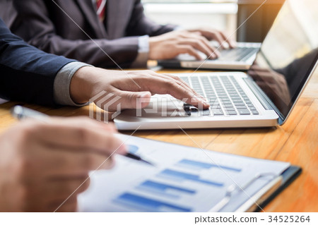 Business man analysed report of profit finance data graph docume Business man analysed report of profit finance data graph docume 34525264