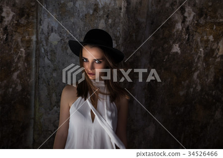 A girl in a white blouse, with tare destroyed 34526466