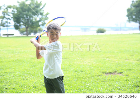 Child with tennis racket 34526646