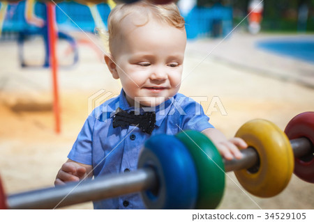 happy child walks in the park in summer happy child walks in the park in summer 34529105