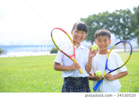 Children with a racket 34530520