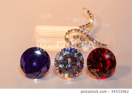 number nine brooches decorated by diamonds. 34533062