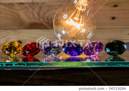Sparkle of diamond from the lamp. Sparkle of diamond from the lamp. 34533084