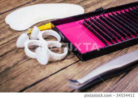 Eyelash Extension tools on wooden background 34534411