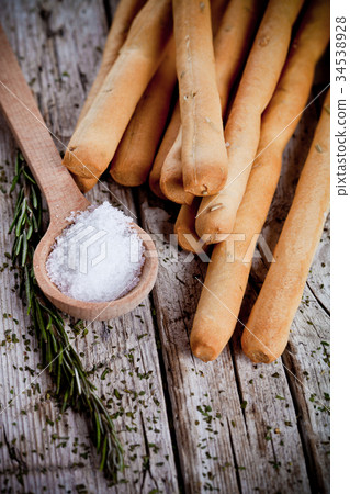 bread sticks grissini with rosemary and salt 34538928