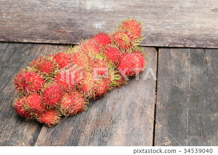 rambutan sweet fruit fresh on wood background rambutan sweet fruit fresh on wood background 34539040