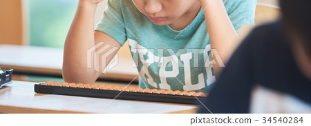 Elementary school student abacus classroom Elementary school student abacus classroom 34540284