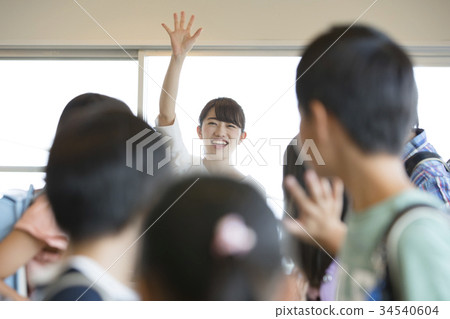 Primary schoolchild group leaving school Corridor 34540604