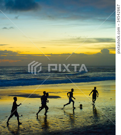 Soccer on the beach. silhouette 34542667
