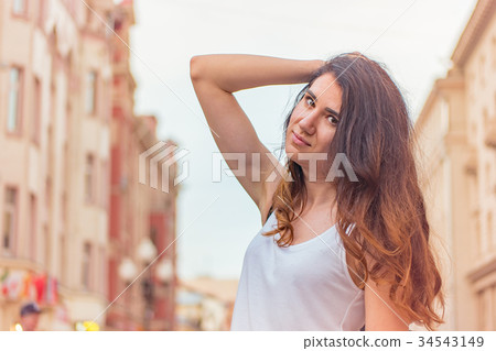 Girl on summer day in the street. Girl on summer day in the street. 34543149