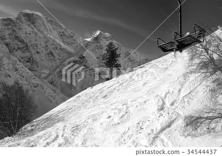 Black and white view on old chair lift Black and white view on old chair lift 34544437