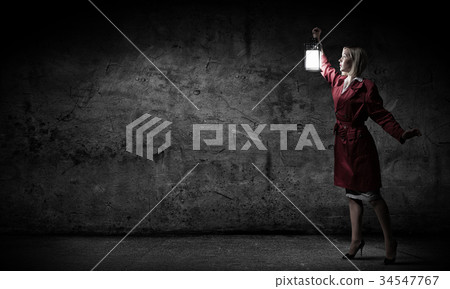 Woman with lantern 34547767