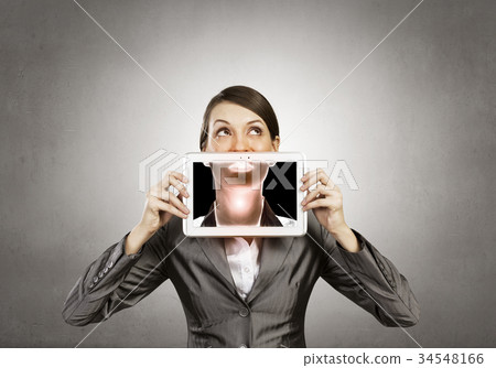 Woman with tablet 34548166