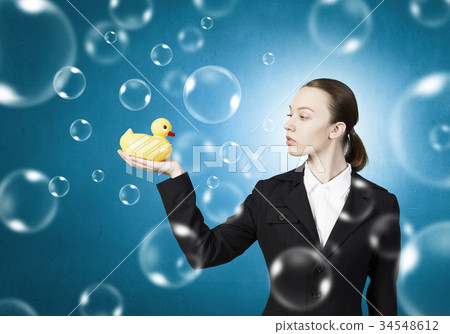 Woman and duck 34548612