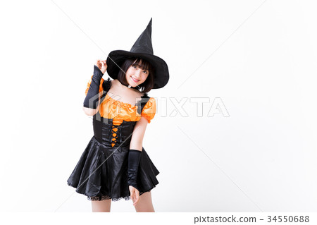 Girl doing witch cosplay at Halloween Girl doing witch cosplay at Halloween 34550688
