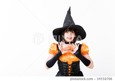 Girl doing witch cosplay at Halloween Girl doing witch cosplay at Halloween 34550706