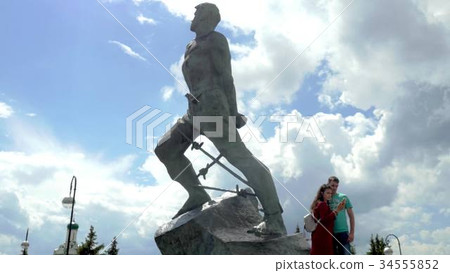 Young couple taking a selfie on a mobile phone on 34555852