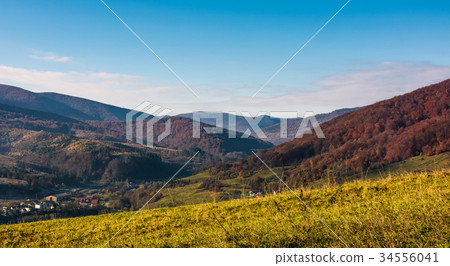 grassy hillside in mountainous rural area grassy hillside in mountainous rural area 34556041