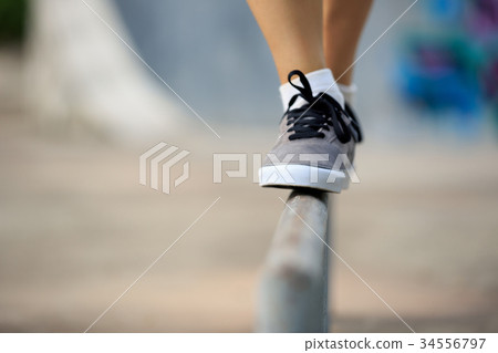 legs walking on steel pipe with balance legs walking on steel pipe with balance 34556797