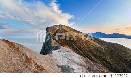 Rocks and sea. Dramatic scene. 34557092