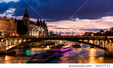 Conciergerie and Pont Notre-Dame at night. Paris 34557711
