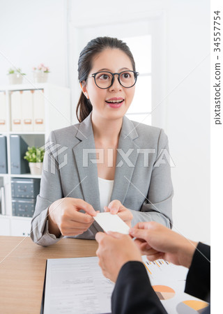 company agent exchanging personal business card company agent exchanging personal business card 34557754