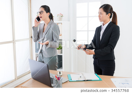 female business helper waiting for reporting female business helper waiting for reporting 34557768