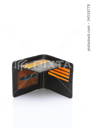 One leather purse on a white background 34558778