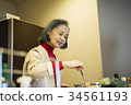 60s women cooking 34561193