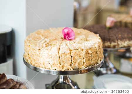 Different kinds of baked sweets on a buffet 34563400