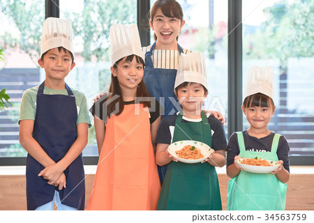 Primary school children cooking classroom 34563759